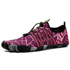 Red and black athletic shoe with unique pattern