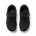 A pair of black children's barefoot shoes  with hook and loop strap closures, black laces, and a subtle dark blue dotted pattern on the side panels, shown from a top down view.
