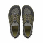 A pair of minimalist barefoot style shoes. The shoes feature an olive green and dark grey mesh upper with matching olive green laces and a flexible sole.