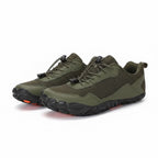 Green mens Velocity barefoot shoes with a black sole, perfect for all day activities weather its shopping or socialising these are perfect.