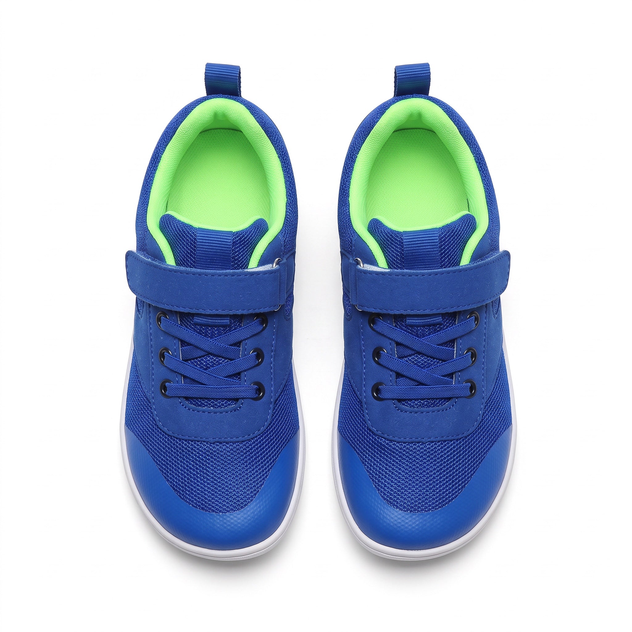 A pair of blue children's barefoot shoes with bright green lining and white soles, shown from a top down view. 