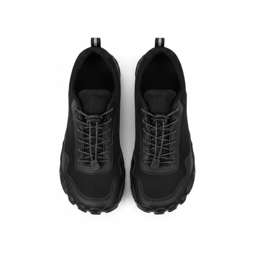 A pair of Mens black athletic Barefoot shoes shown from a top down view 