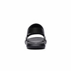 Close front view of black barefoot sandal showing adjustable straps and open toe design