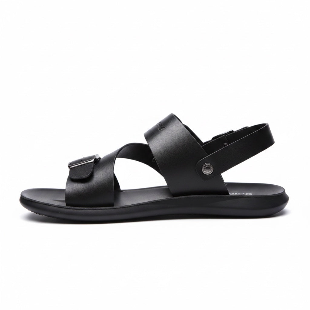 Side profile of a black minimalist barefoot sandal with adjustable buckle straps
