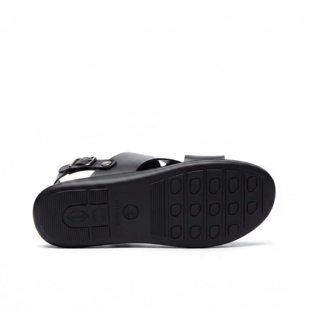 Bottom view of black barefoot sandal showing flexible textured rubber sole