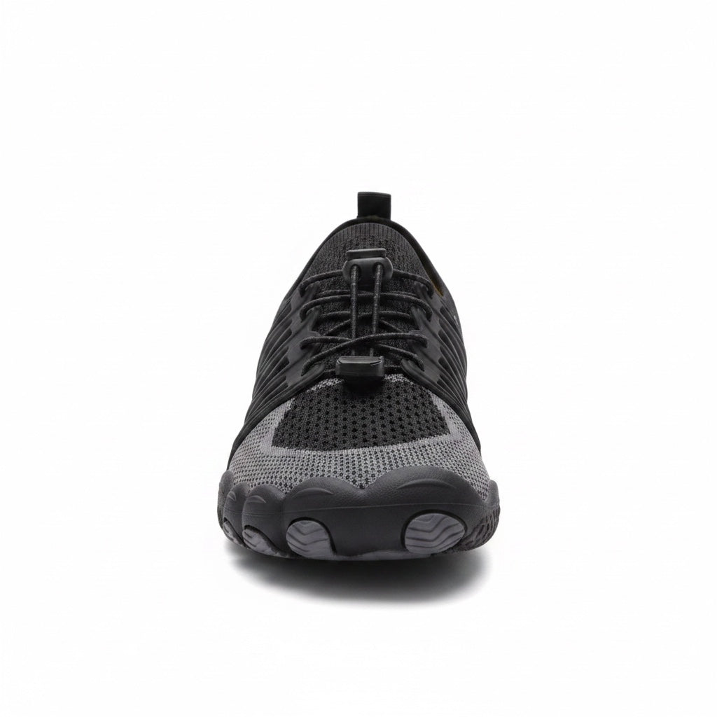 Front view of a black unisex barefoot shoe with flexible rounded toe area