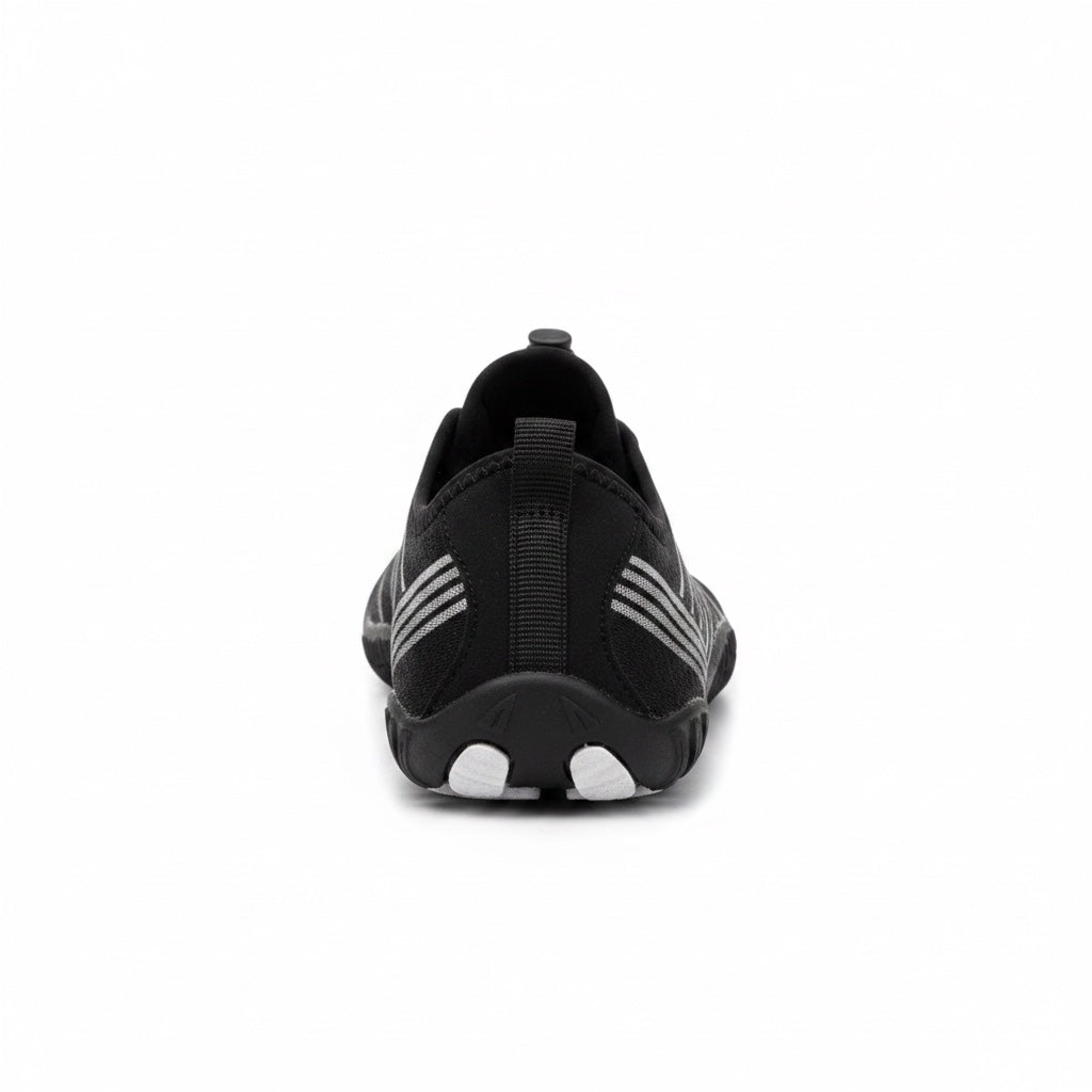 Rear view showing the heel structure and minimalist construction.