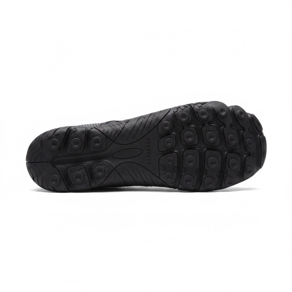 Bottom view of a black barefoot shoe showing its textured rubber traction sole