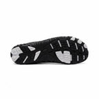 Bottom view showing the textured outsole designed for flexibility and everyday grip.