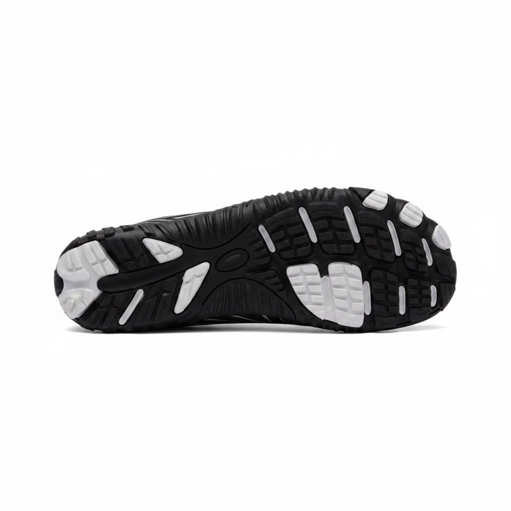 Bottom view showing the textured outsole designed for flexibility and everyday grip.