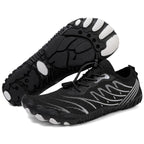 Pair of black barefoot shoes displaying the overall shape and flexible sole design.