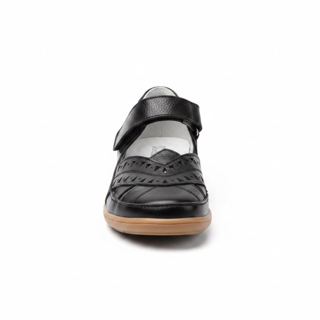 Front view of a black women's comfort sandal with adjustable straps and closed toe