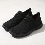 Black Men's knit Aura barefoot shoes. these barefoot shoes are very stylish and elegant. Built with wide toe and very light and great for foot pain.