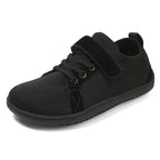 Black Barefoot children's shoes with velcro strap on.