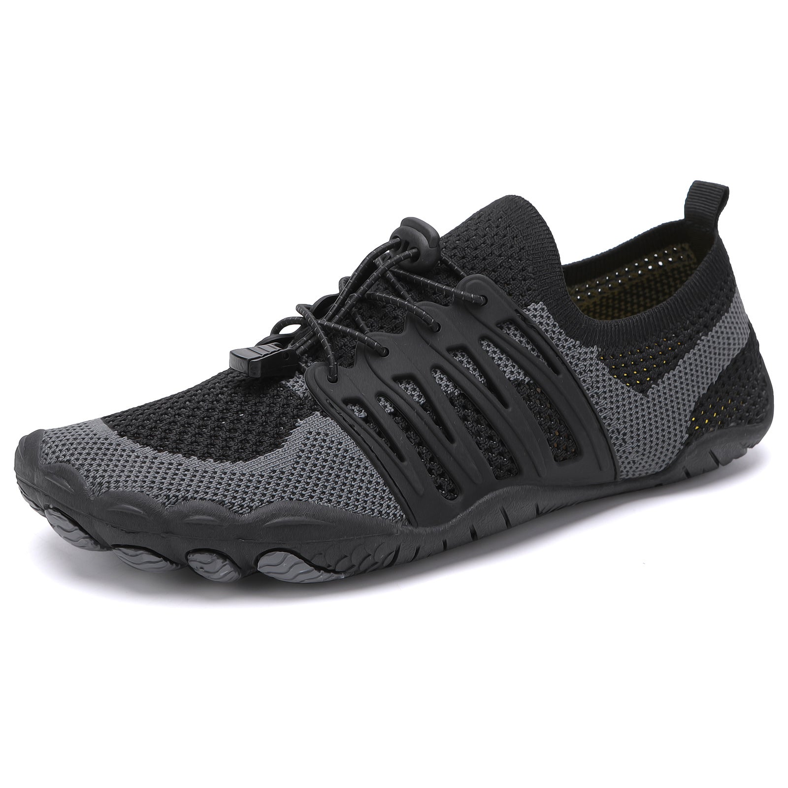 Black unisex barefoot shoe shown from the side with breathable mesh upper and flexible sole