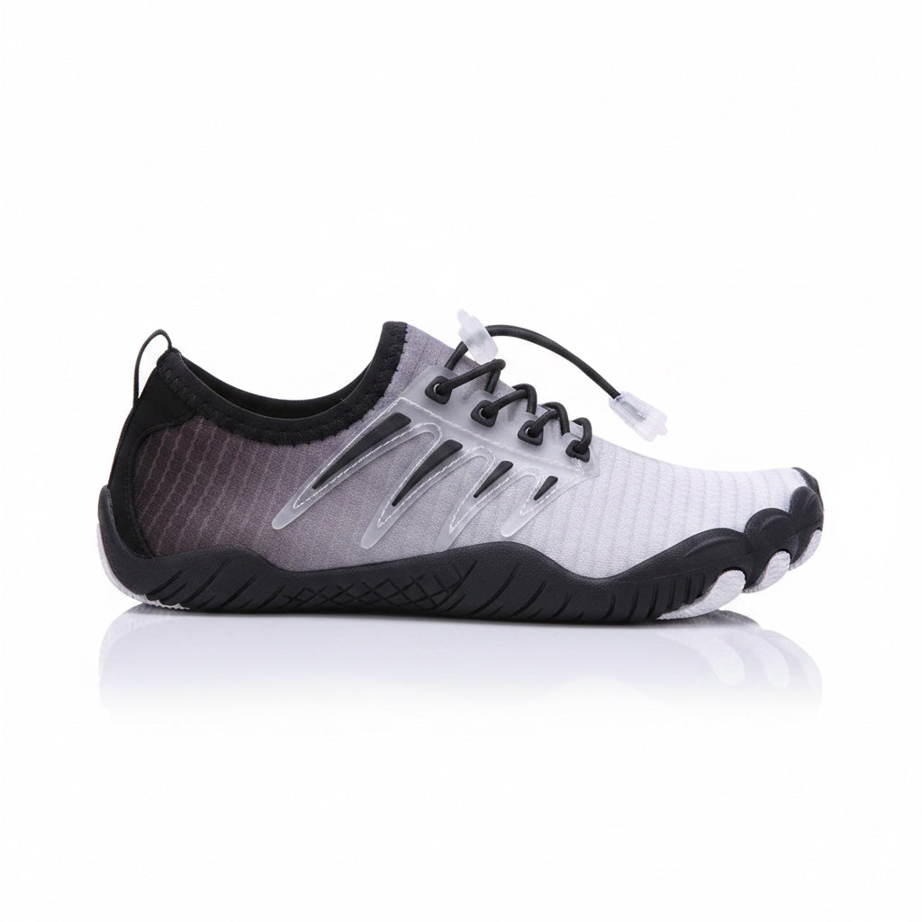 Black and grey barefoot water shoe with flexible rubber sole and breathable upper
