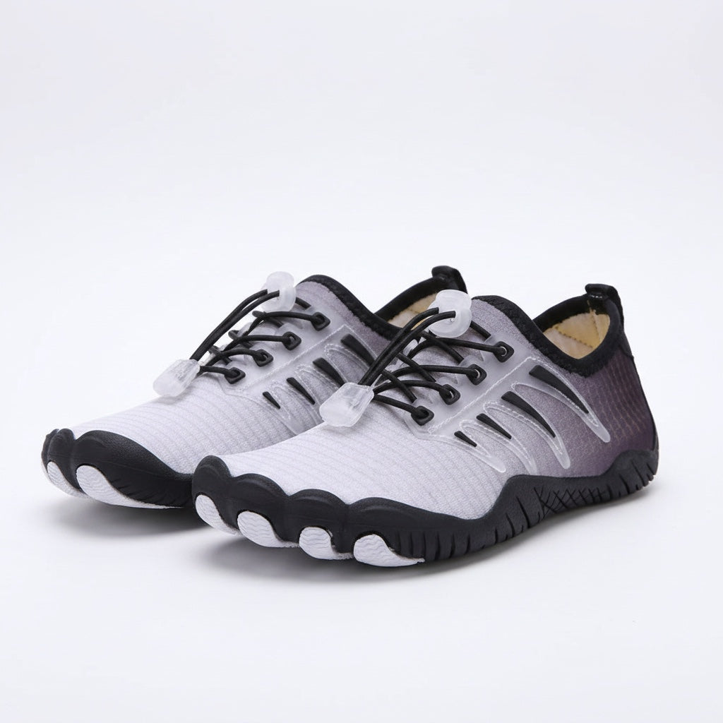 Pair of black and grey barefoot water shoes with flexible soles and lightweight design