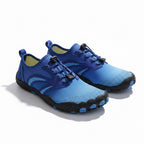 Blue barefoot shoes with blue laces and black rubber soles. Widfe toe for natural movement.