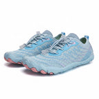 Angled view of the blue barefoot shoes showing their minimalist design and natural foot shape.