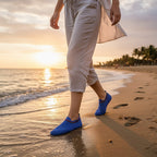 Blue barefoot water shoes worn on a beach