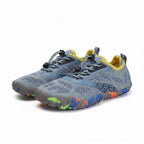 Pair of blue and grey kids water shoes with colourful flexible soles and breathable uppers