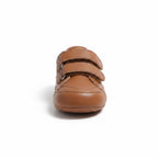 Front view of a brown baby shoe with double adjustable straps and rounded toe