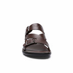 Bottom view of brown barefoot sandal showing textured flexible rubber sole