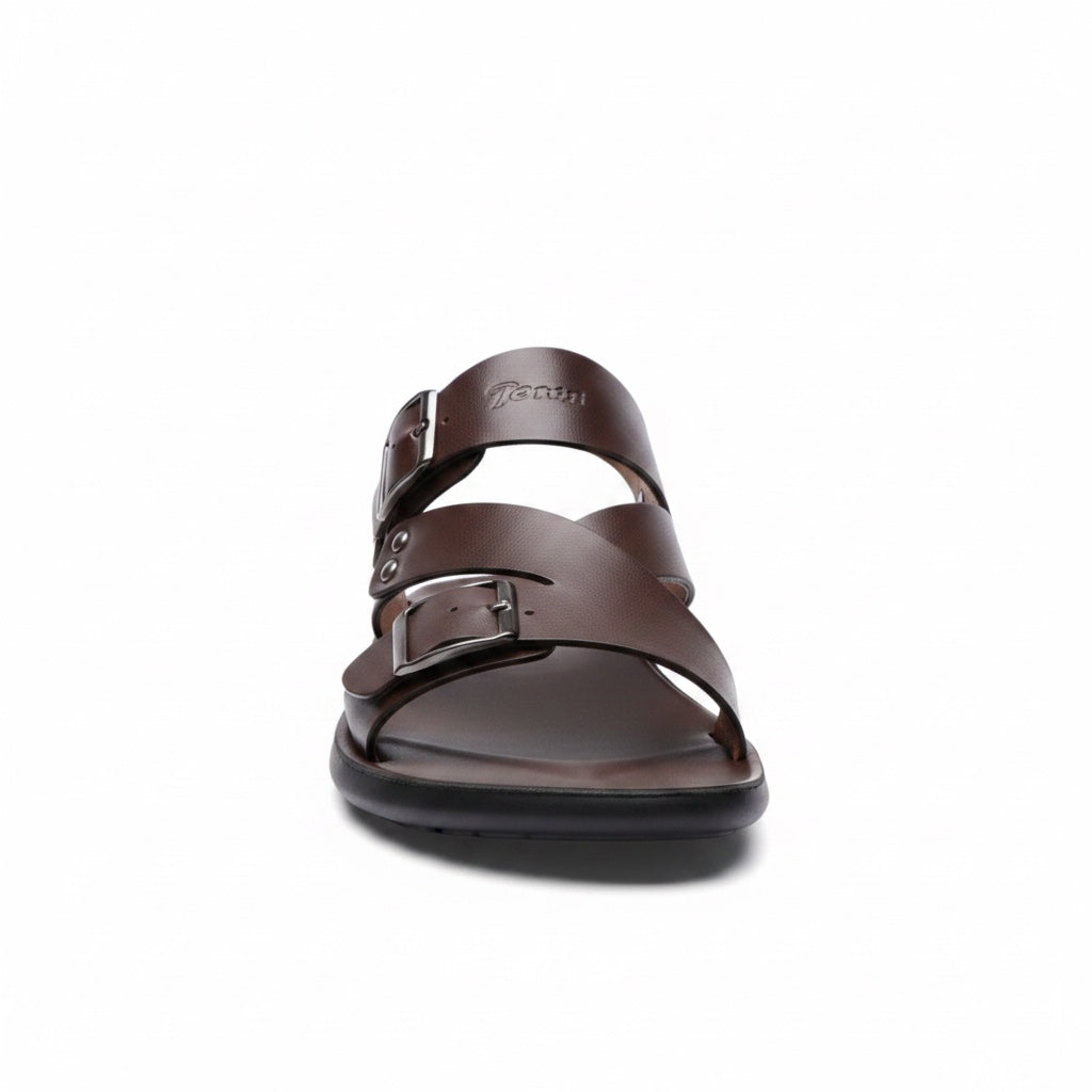 Bottom view of brown barefoot sandal showing textured flexible rubber sole
