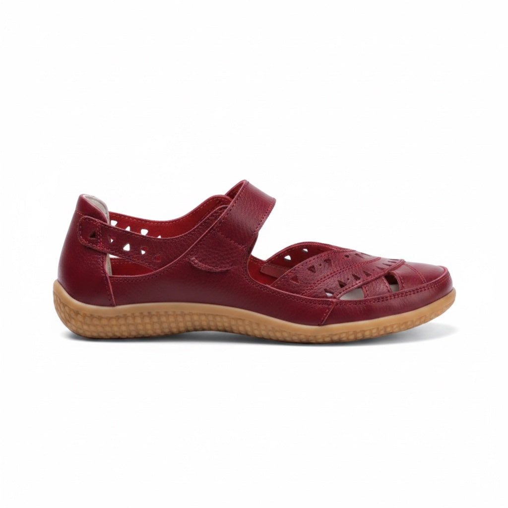 Burgundy women's comfort sandal with adjustable strap, perforated upper, and flexible sole