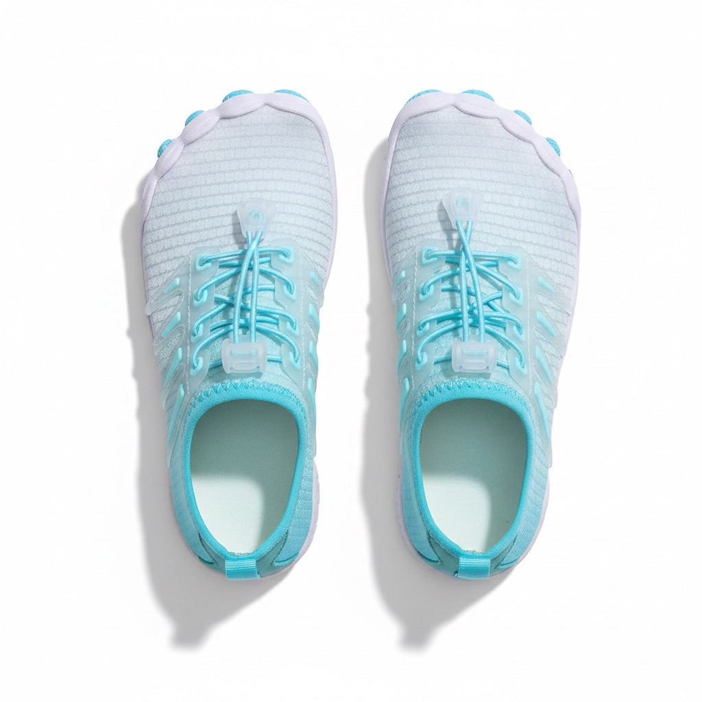 Light blue and white athletic shoes. looking from a top view.