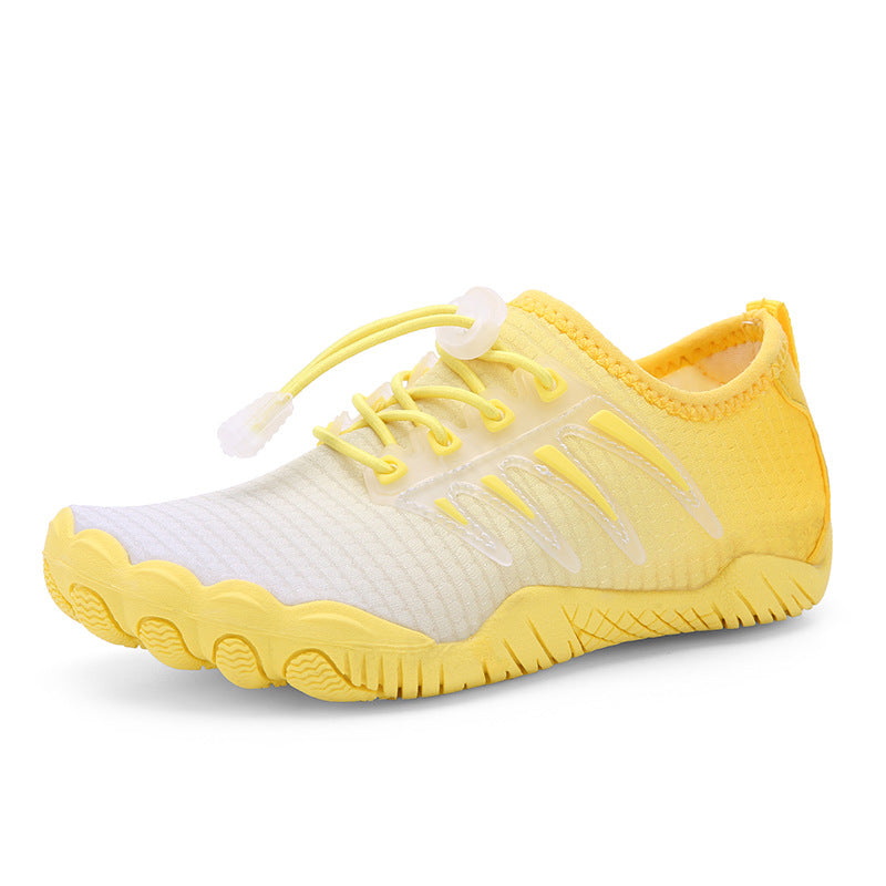 Yellow and white shoes with yellow laces