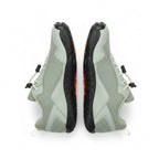 Green Barefoot Men's shoe on a side view.