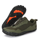 Green mens barefoot shoes with black and orange sole. perfect for everyday use.