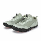Green mens barefoot shoes with a black and orange sole. Perfect for socialising gives all day comfort.
