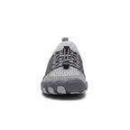 Front view of a grey unisex barefoot shoe with breathable upper and flexible sole