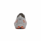 Rear view showing the heel structure and orange outsole detailing.