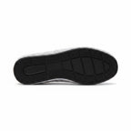 Bottom view of grey water shoe with textured non-slip sole