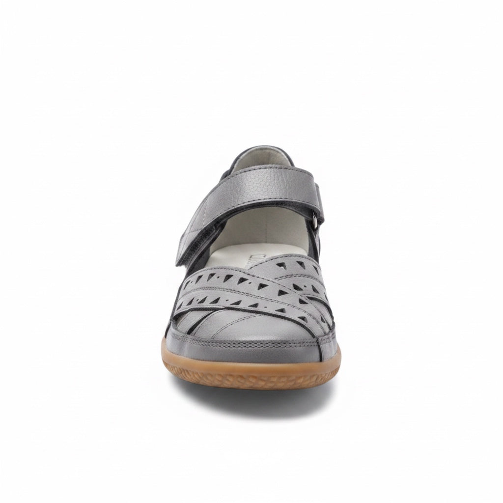 Front view of a grey women's comfort sandal with adjustable strap