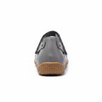 Rear view of a grey comfort sandal with adjustable heel strap and brown sole