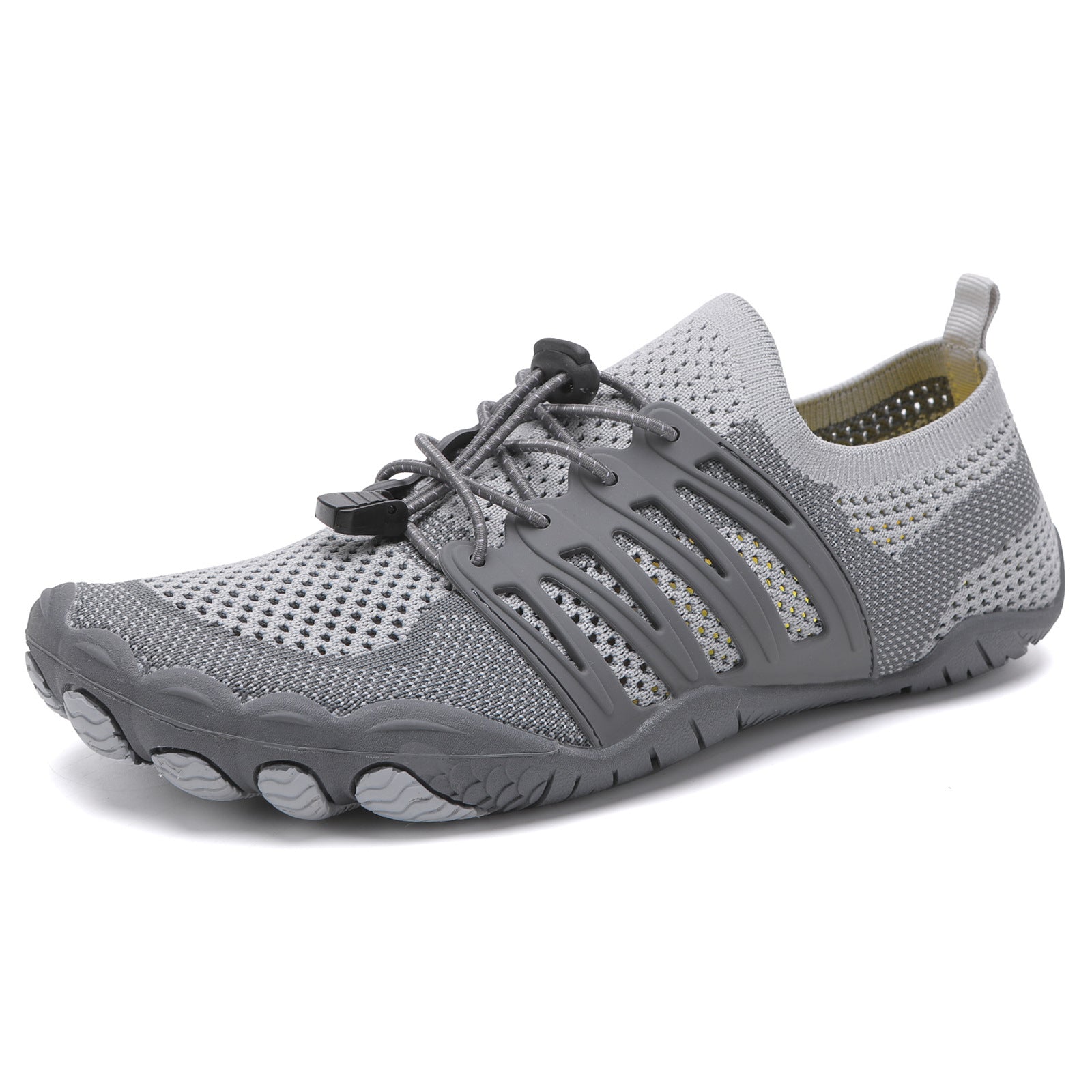 Pair of grey unisex barefoot shoes with lightweight breathable uppers and flexible soles