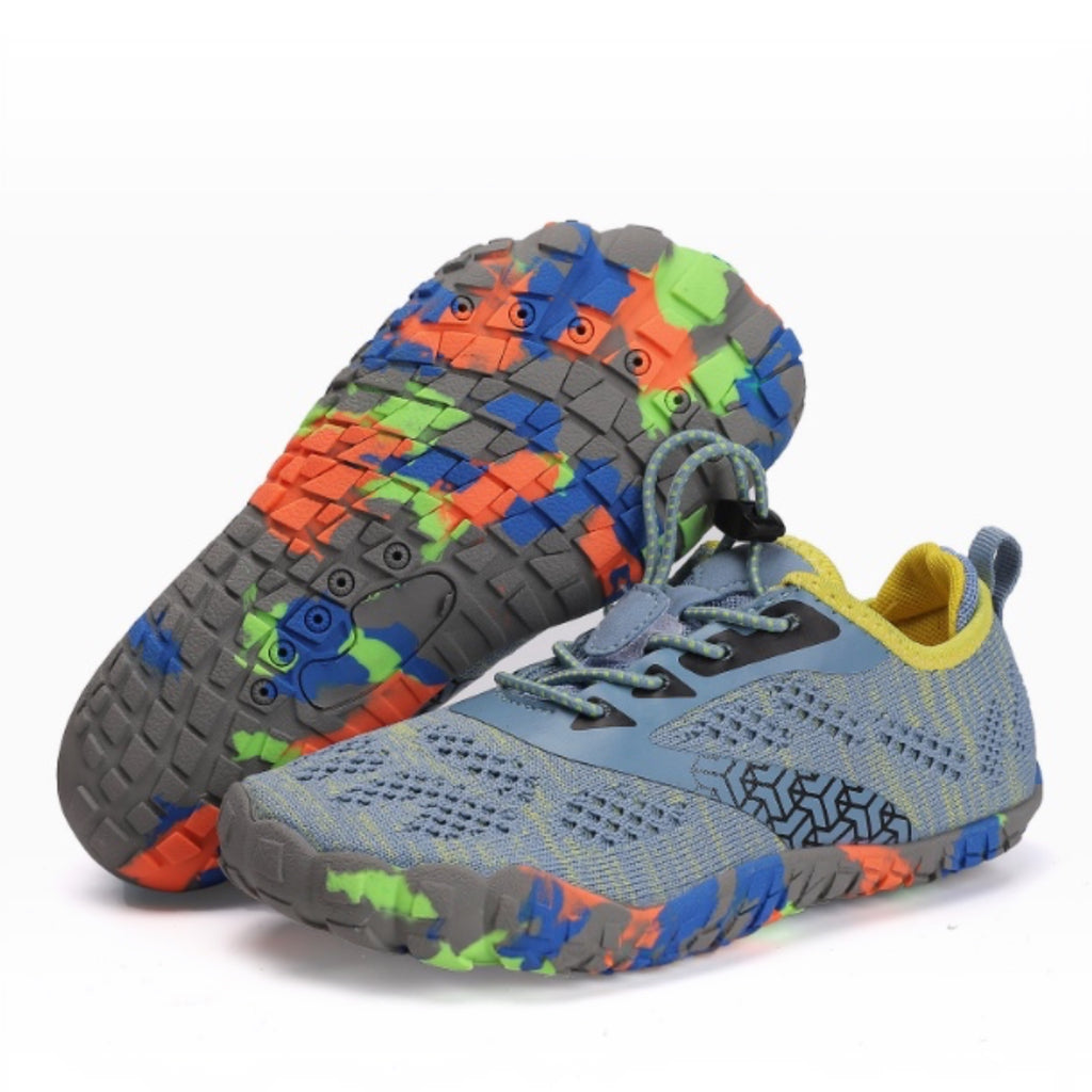 Blue and grey kids water shoes shown with their colourful textured soles facing upward