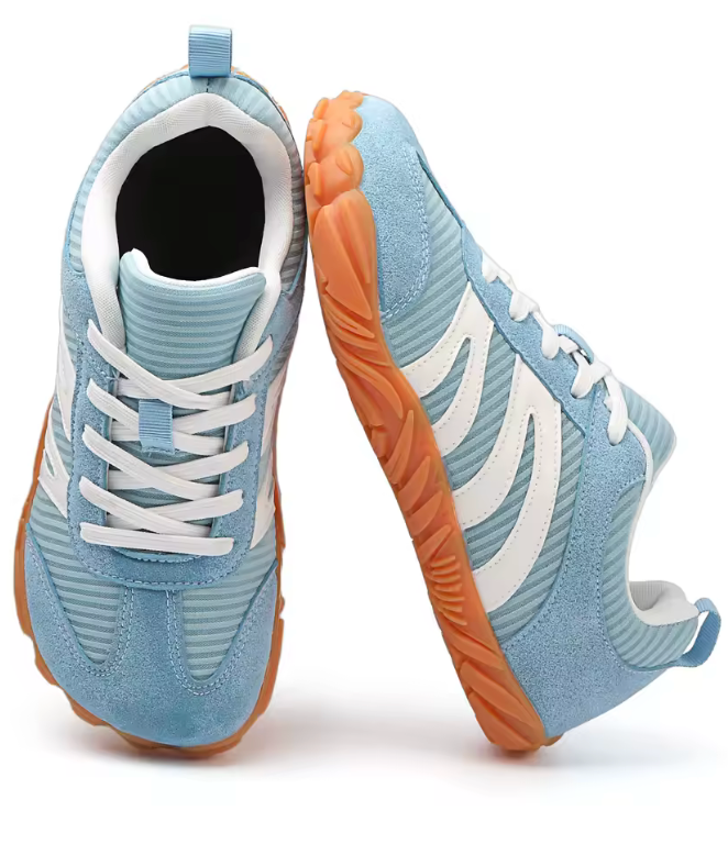 Light Blue barefoot non slip shoes with white laces. lightweight and wide toe for natural movement