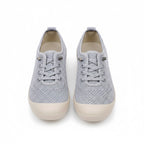 A pair of light grey knit lace up loafers shoes with off white rubber soles.