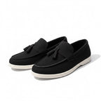 Black loafers with white soles