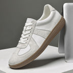 White Loafers with brown sole.