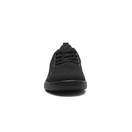 Front view of a black men's knit barefoot shoe with black laces and rounded toe.
