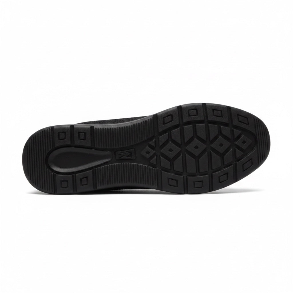 Bottom view of a black men's knit barefoot shoe showing the patterned rubber outsole.