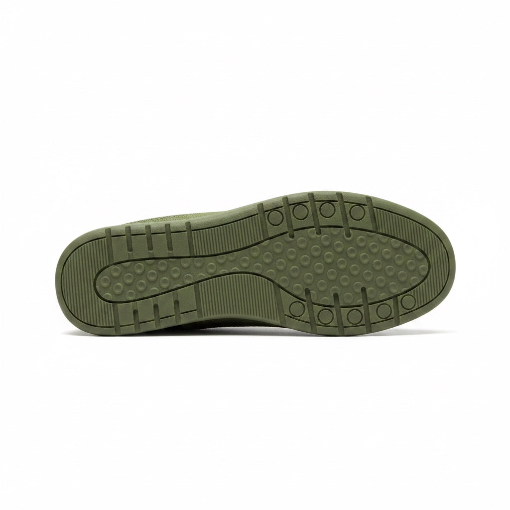 Bottom view of an olive green men's knit barefoot shoes showing the patterned rubber outsole.