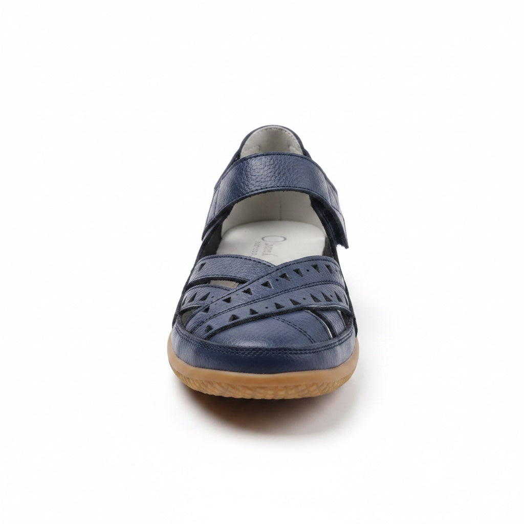 Front view of a Navy Blue comfort sandal with adjustable straps and flexible construction