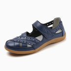 Navy Blue women's comfort sandal with adjustable straps and perforated details
